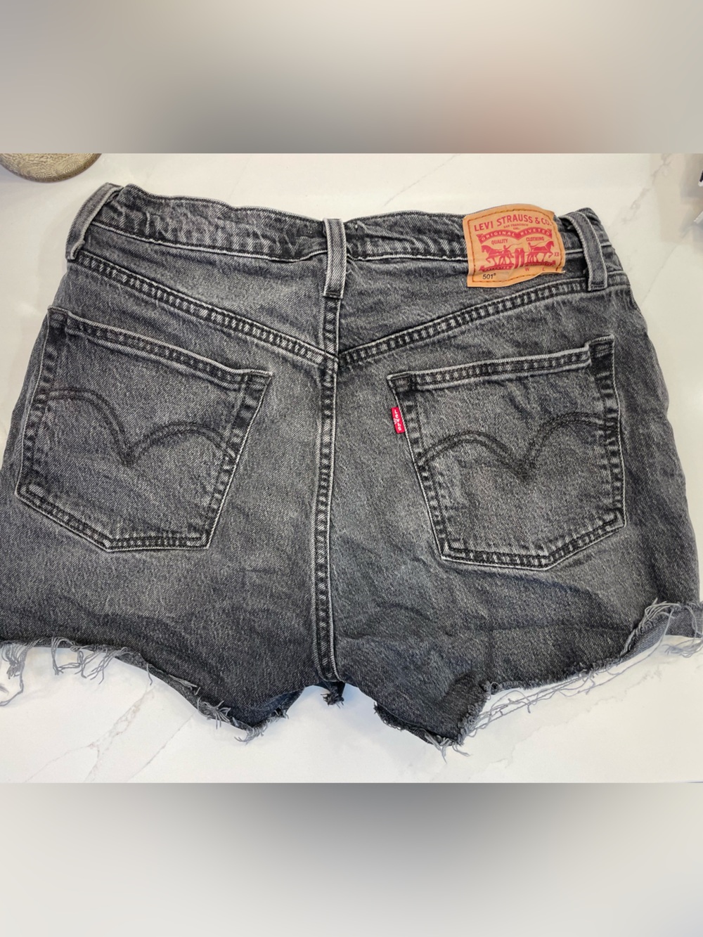 Levi's Blackwashed Denim Cutoff Shorts with Frayed Edges